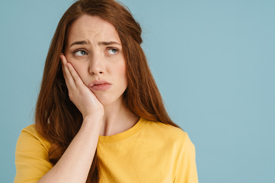 woman with dental bridge that fell out 